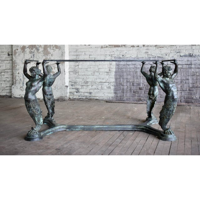 A very special & unusual Italian bronze dining table depicting four supporting Caryatid & Atlas figures with outstretched...