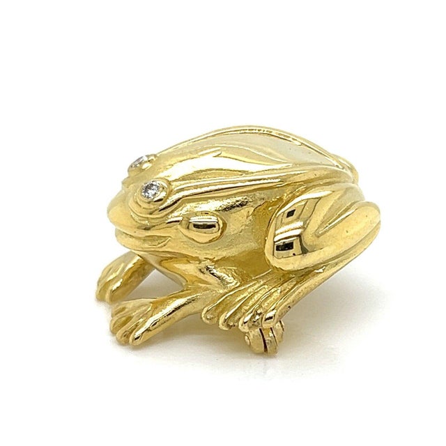 The Kieselstein-Cord Diamond 18k Yellow Gold Frog Brooch Pin is a stunning vintage piece of jewelry crafted by the...
