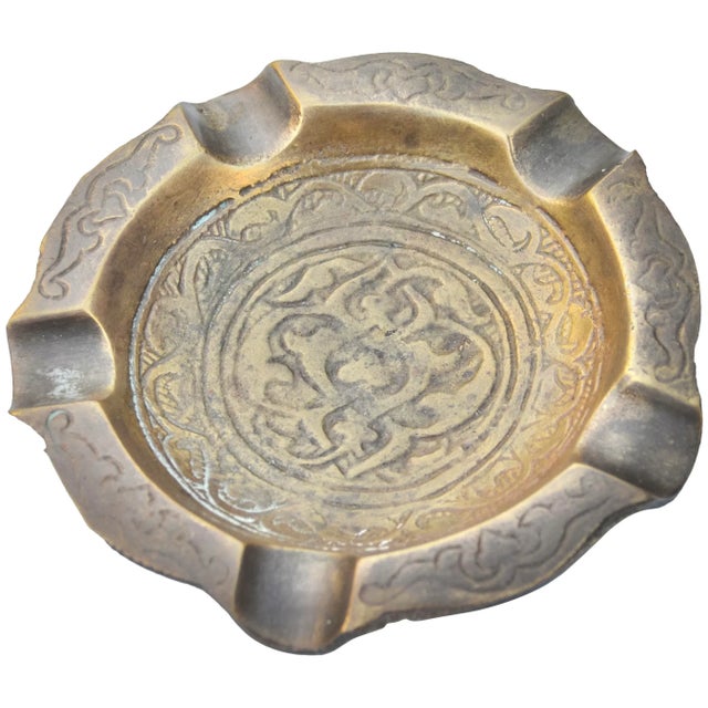 One-of-a-kind antique highly crafted, engraved and detailed Moroccan solid brass ashtray. Featuring an elaborate hand-...