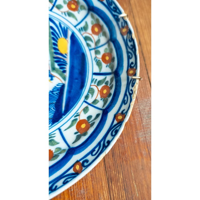 18th Century Pair of Dutch Delf Faience Polychrome Plates With Bird and Flowers For Sale - Image 10 of 14