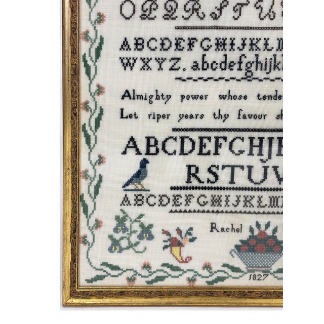 Reproduction Antique Rosebuds Bluebirds Cross Stitch Sampler. Original sampler done by Rachel Ellicott in 1827.