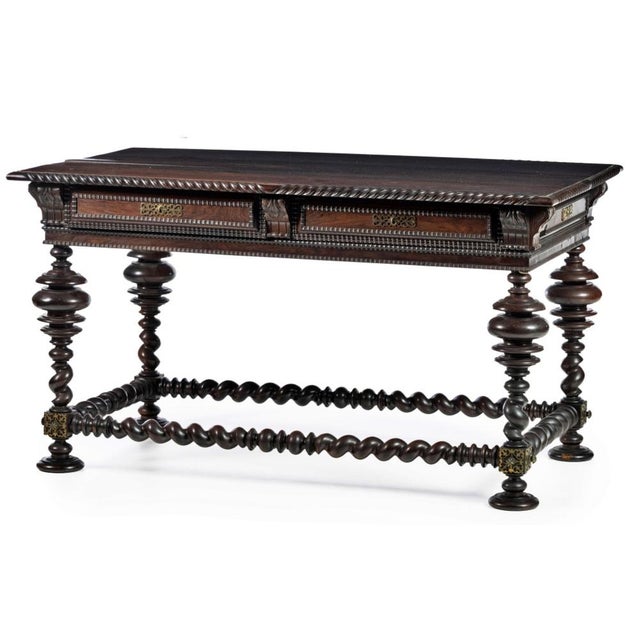 Buffet Table Portuguese, 19th century, made of twisted and trembling mahogany wood. Rectangular top, framed by a trembling...