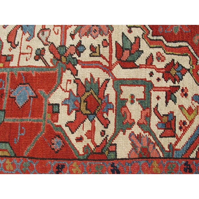 Antique Heriz Rug With Stylized Central Medallion Set on Tomato Red Field For Sale - Image 4 of 9