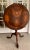 Gorgeous Mahogany tilt top table with handmade inlays in the top of the table. Because of its tilt top, it could be used...