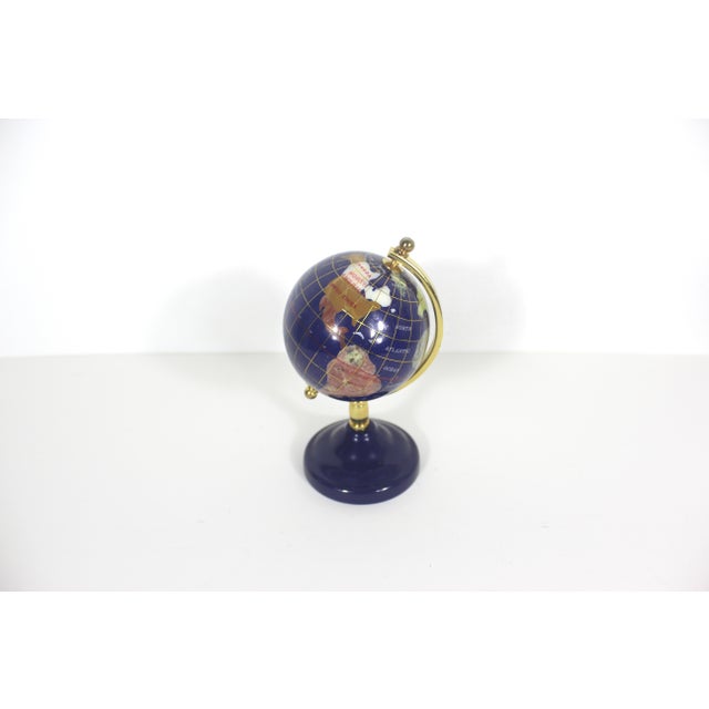Wow! True collector’s piece. This small globe is made from semi precious gemstones with a Lapis Lazuli background. Simply...