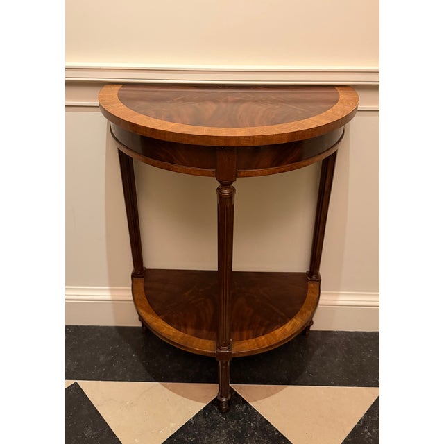 Stunning Crotch Mahogany and Movingue 2 Tier table with 3 legs by Maitland-Smith Originally a round table but this was...