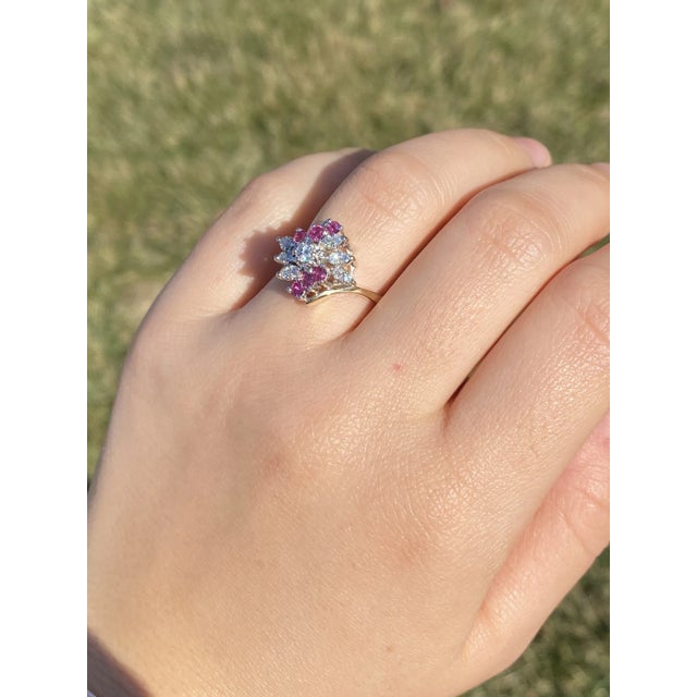 The Calville: Ladies 14K Two Tone Ruby and Diamond Cluster Bypass Ring. This exquisite 14 karat two tone cluster bypass...