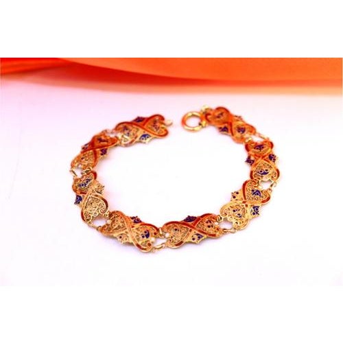 Gold bracelet with red and blue enamel and articulated links. Metal: Gold. Origin: Portuguese. Brand: Tigre II. Title....