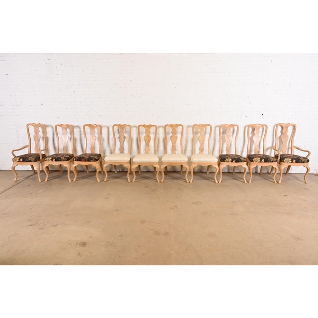 A gorgeous set of ten Queen Anne or Georgian style dining chairs By Drexel Heritage USA, Late 20th Century Carved oak,...