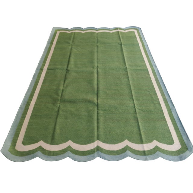 Cotton Scalloped Edge Reversible Rug. Scalloping runs along 6' sides. These special flat-weave dhurries are hand-woven...