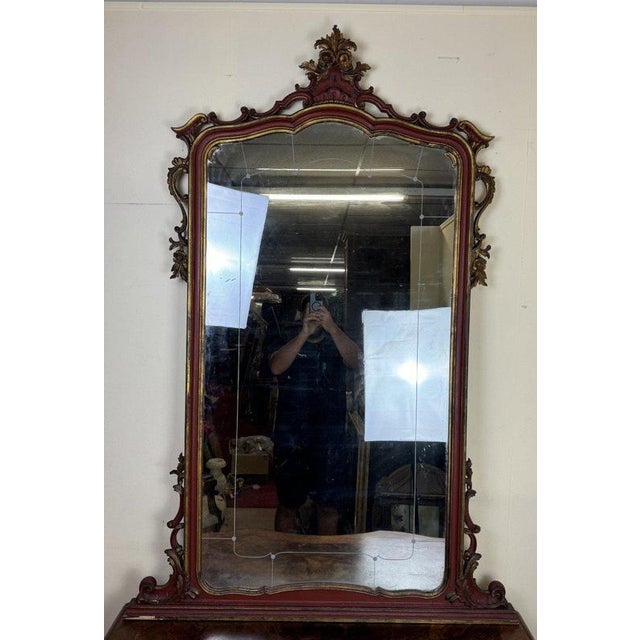 Large Louis XV style Baroque Venetian mirror in lacquered and gilded wood shell pediment decorated with relief carvings...