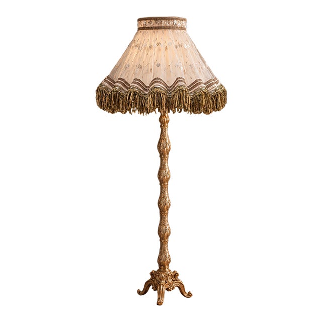 French-Style Gilded Floor Lamp – Ornate Gold Leaf Stand With Embroidered Fabric Shade & Fringe For Sale