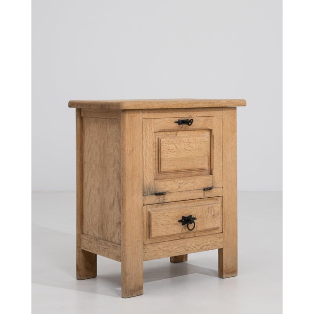 A commanding example of French Brutalist design from circa 1970, this bar cabinet embodies the movement's devotion to raw...