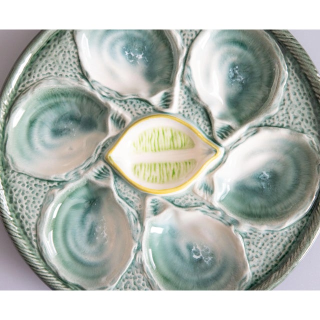 A lovely antique French majolica trompe l'oeil oyster plate made at the famous St. Clement faience factory in the East of...
