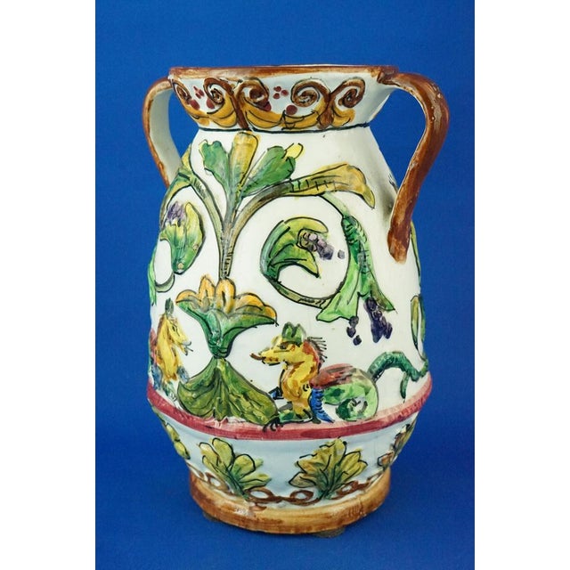 Item description: delightful two-handled vase in the shape of a roman amphora, made of glazed and vitrified ceramic,...