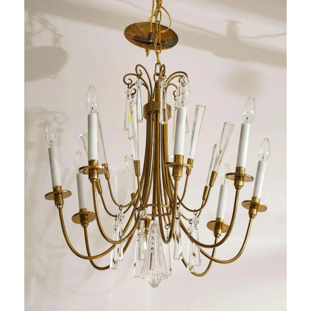 Stunning 1960s modern chandelier in the style of Tommi Parzinger by Lightolier made in Germany, in vintage original...