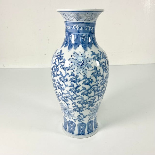We fell in love with the soft Cornflower blue of this pretty Chinoiserie vase. The design features scrolls and daisy-like...
