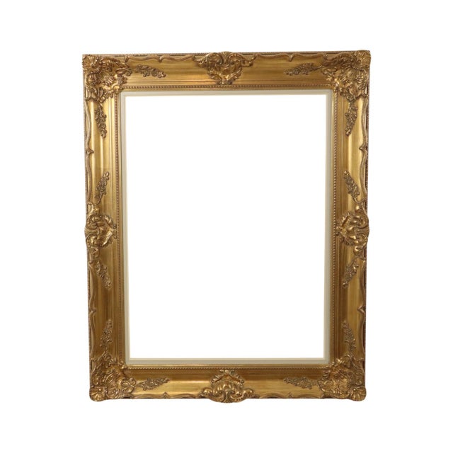 Large golden vintage pine frame with a beautiful patina of age, XL size, entirely in classic Baroque style, decorated with...