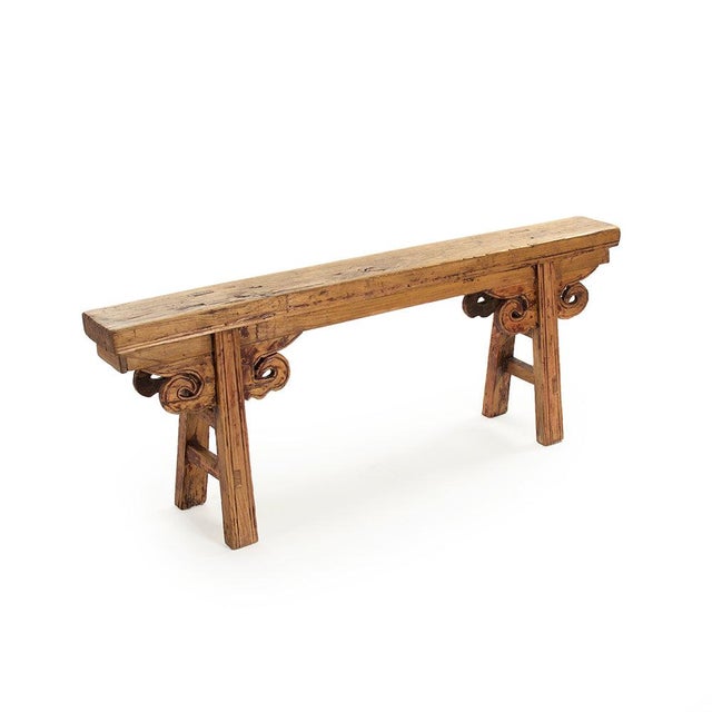 The Story Bench from Zentique is a minimalist reclaimed elm bench with a thick plank seat on simple straight legs. The...