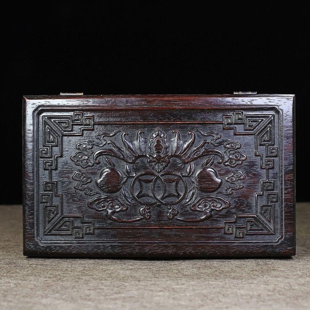 This beautifully crafted rectangular box features a rich, dark reddish-brown wood grain (described as Rosewood /...