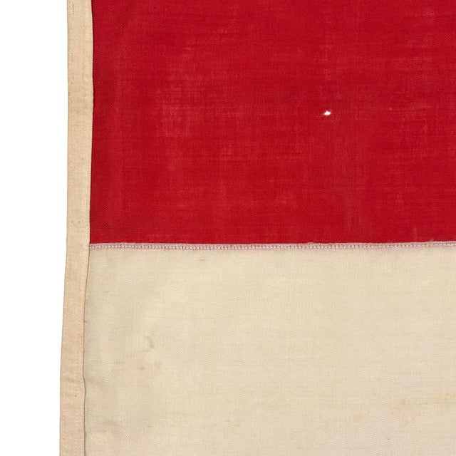 This vintage English flag is fully sewn from a wool cloth. Please note minor holes, staining, and other wear from age....