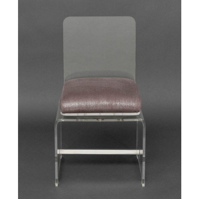 Modern Clear Acrylic Swivel Side Chair, with purple iridescent upholstered cushion on waterfall base. 30" H x 17" W x 16"...
