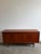 Norwegian teak sideboard attributed to Gustav Bahus, produced in the 1960s. The case features four key locking cabinet...