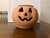 Add a touch of rustic charm to your seasonal decor with this delightful vintage red clay jack-o'-lantern. This unique...