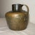 Crafted with meticulous attention to detail, this rare early 19th century copper jug is a testament to the skill and...