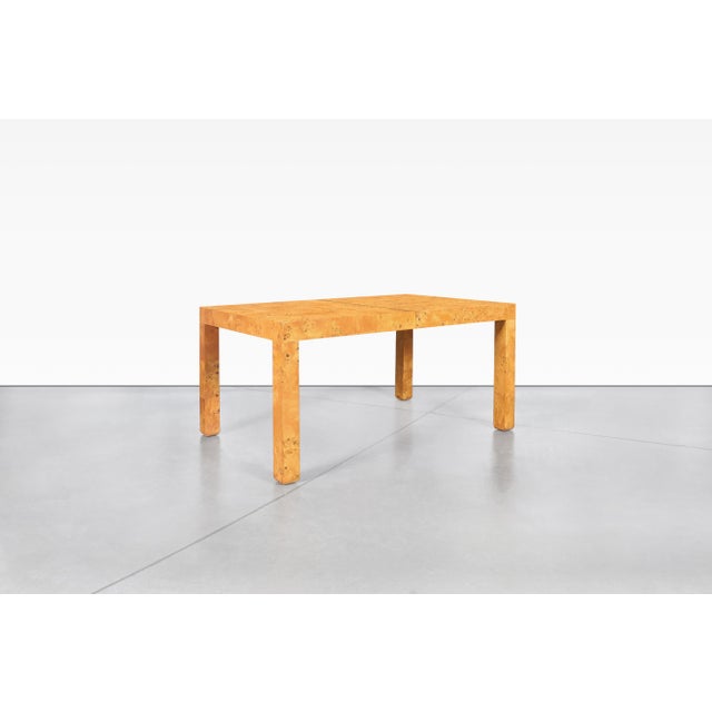 A stunning mid-century modern dining table, a remarkable piece designed by the one and only Milo Baughman and expertly...