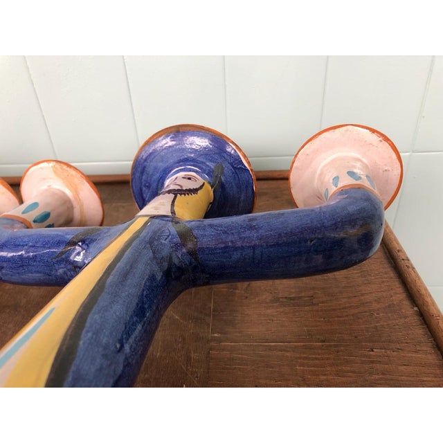 Pair of candelabra with three flames Completely handmade. In glazed terracotta in hand painted ceramic Branded on the...