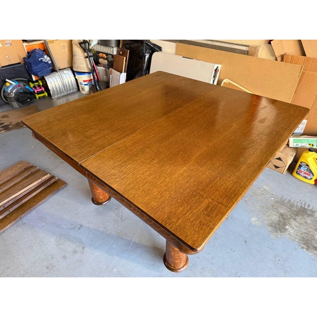 Antique Victorian Style Tiger Oak Table, Square Dining Table with Leaves table features a split pedestal 5-leg base for...