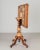 A 19th Century Italian marquetry tilt-top center table made of solid walnut with inlaid veneers of walnut and various...