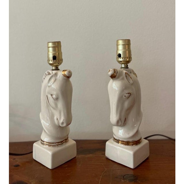 Pair of ceramic lamps of chess piece-horse-heads.