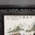 This is a magnificent and monumental vintage Chinese Rosewood Screen featuring a large, hand-painted Famille Rose...