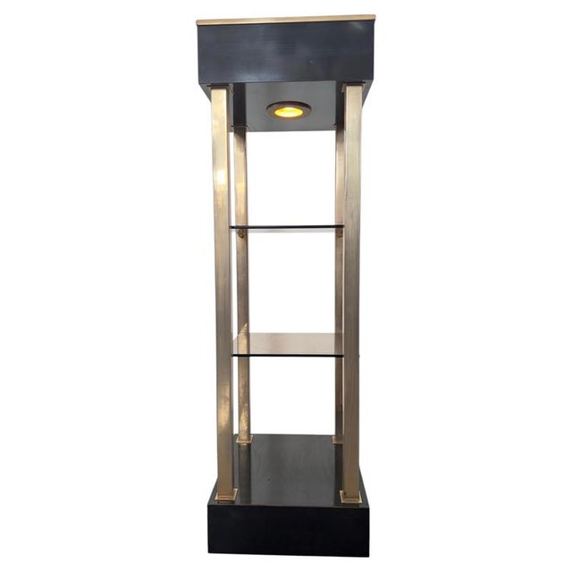 Hollywood Regency style display column designed by the renowned Belgian manufacturer Belgo Chrom during the 1970s....