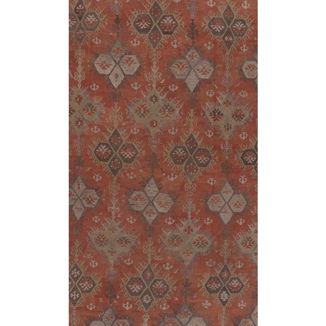 Handwoven in the 1940s, this vintage Turkish flat-weave Kilim exemplifies timeless craftsmanship. Its bold geometry and...