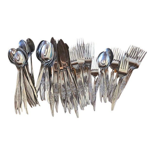 Mid Century Wild Rose Stainless Flatware- Set of 66 For Sale