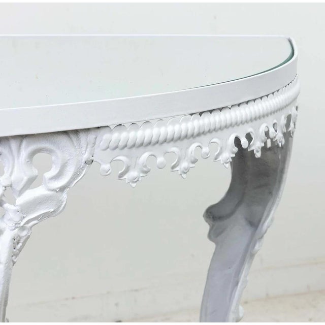 Painted Iron Demi Lune Table with inset mirror top. Overall good condition with few scratches to mirror top. Recently...