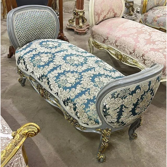 Stunning lovely marquise/bench/settee. This is fully refinished in gold leaf and tufted in high end designer blue fabric....