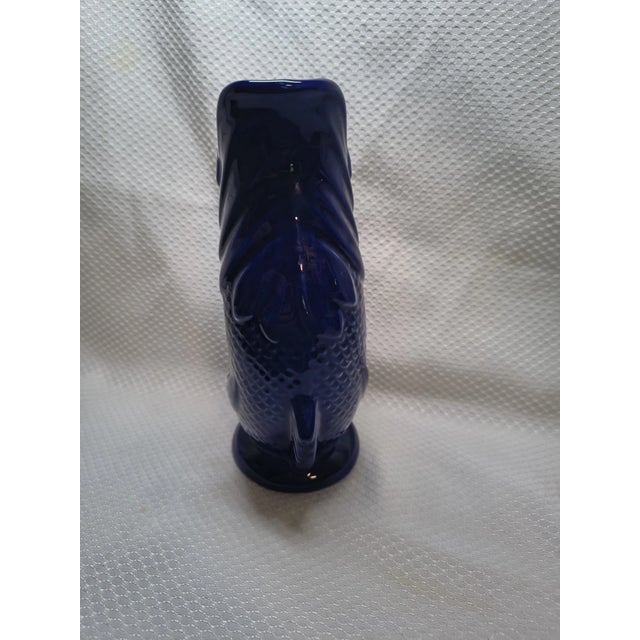 Make a splash in your vintage collection with this eye-catching **Vintage Wade Ceramics Cobalt Blue Gluggle Jug**!...