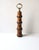 An Italian wood bamboo peppermill with brass hand fist detail, circa mid-20th century, Italy. An Italian, wood pepper mill...
