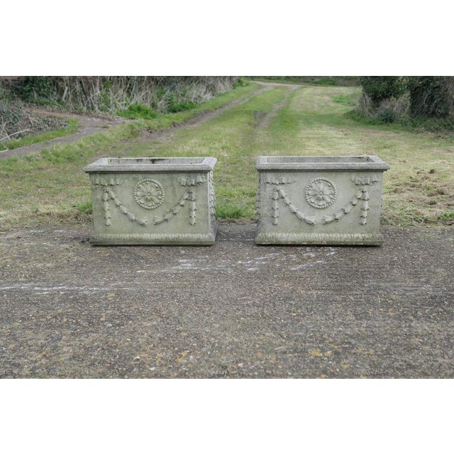 A Pair of Large Weathered Decorative Rectangular Planters These are superb large planters and are decorated with Swags and...