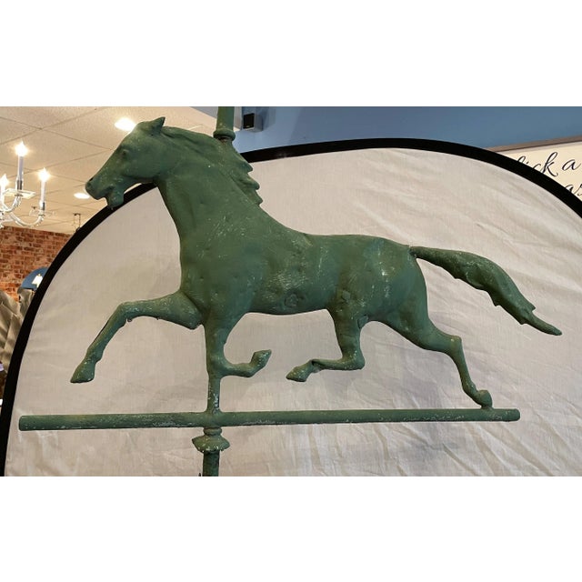 Antique Horse Weather Vane with heavy aging and patina. It is missing 3/4 of the "W" and one missing leg at the base. As...
