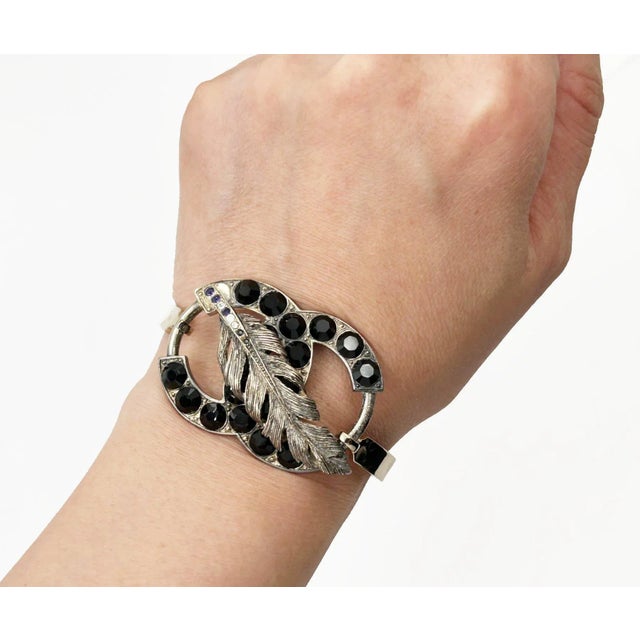 Chanel Silver CC Black Crystal Bangle Cuff Bracelet *Marked 06 *Made in France *Comes with the original box, -It is...
