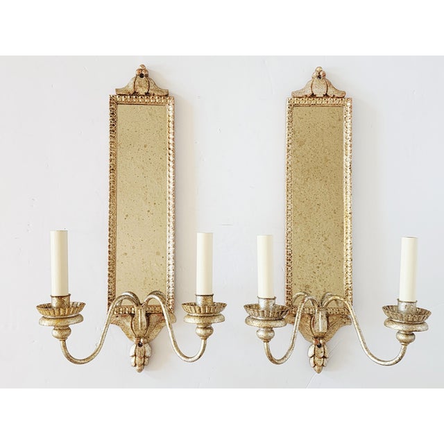 Gorgeous pair of Vaughan Lighting Designs "Granville" mirrored sconces, in an hand decorated antique silver leaf finish...