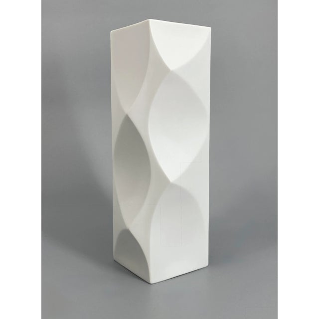 A vase * Made of biscuit porcelain * Designed by Heinrich Fuchs * Manufacturer: Hutschenreuther * Model: "Archais" * Model...