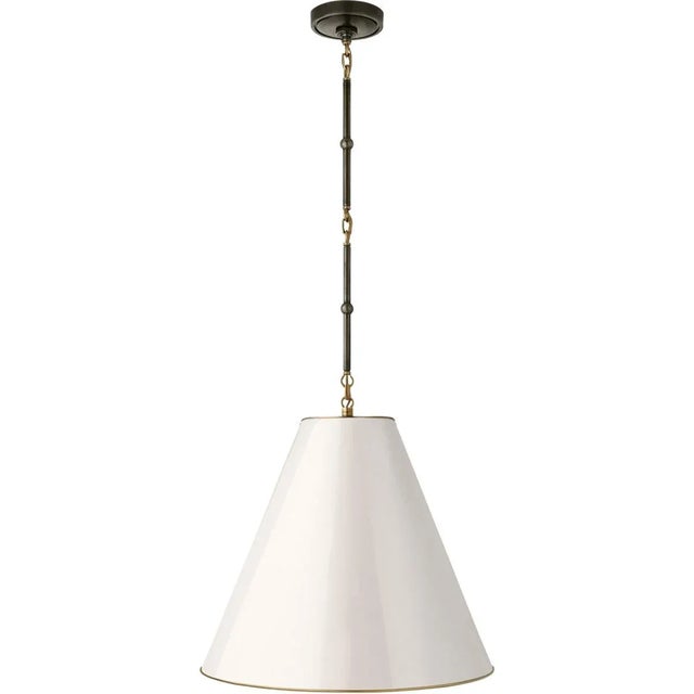Goodman Medium Hanging Light in Bronze and Hand-Rubbed Antique Brass with Antique White Shade Designer: Thomas O'Brien...