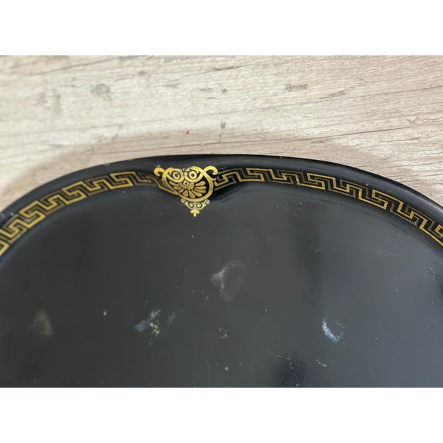 Superb napoleon iii period tray, crafted from black lacquered sheet metal, richly decorated with fine gold motifs, typical...