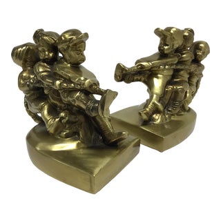 Mid Century Heavy Brass Bookends Tug-A-War - a Pair For Sale